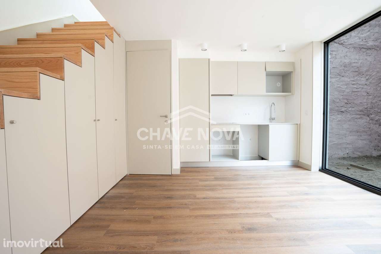 Vila T1 com jardim em Bonjardim - Grande imagem: 3/13