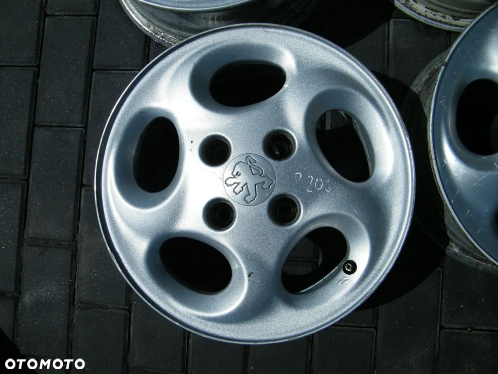 Felgi aluminiowe alufelgi komplet 4x108 ET34/5,5J x 14 otwór 64 - 4