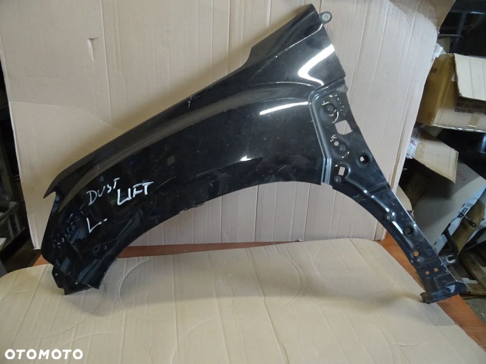 DACIA DUSTER LIFTING BLOTNIK LEWY CZARNY UZYWANY SLADY