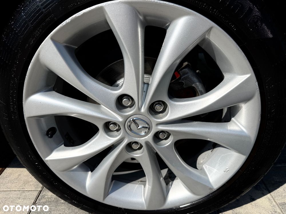 Mazda 3 1.6 Exclusive + - 9