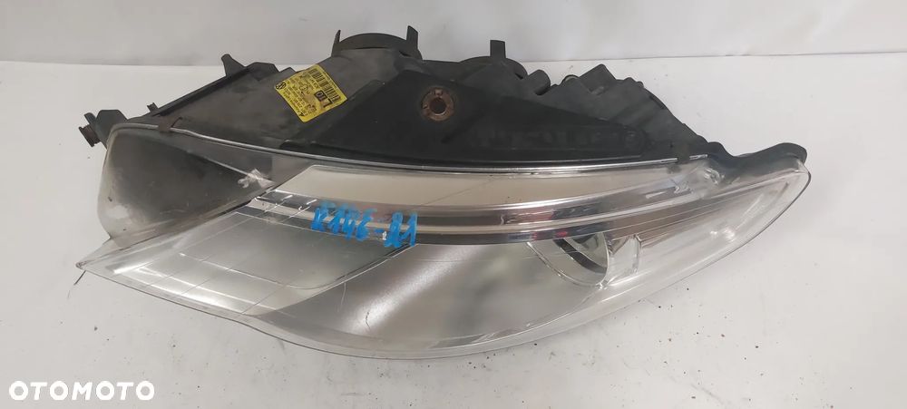 .  PRZOD PRZEDNIA LAMPA LEWA  VOLKSWAGEN PASSAT CC - 2