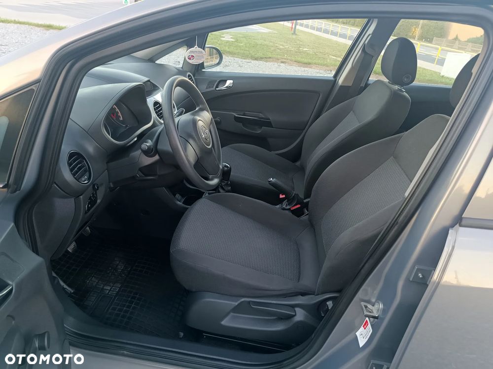 Opel Corsa 1.2 16V Enjoy - 11