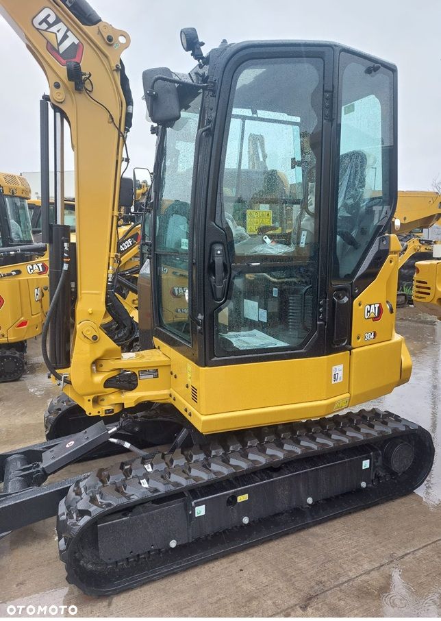 Caterpillar 304 CR / FABRYCZNIE NOWA / GWARANCJA 36 MIESIĘCY / KLIMATYZACJA / PRZECIWWAGA 225 kg / W ZESTAWIE 3 ŁYŻKI / - 4