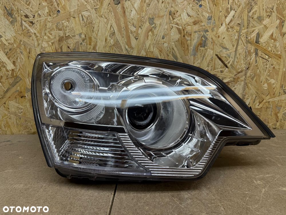 LAMPA PRAWA XENON OPEL ANTARA LIFT - 1