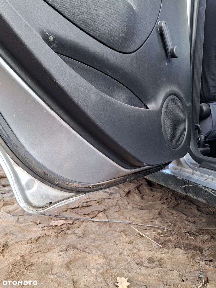 Daihatsu cuore 03 drzwi lewy tyl E28 - 8