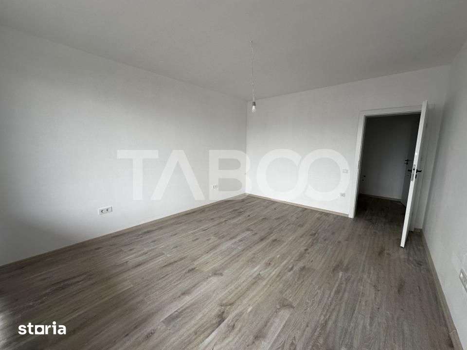 Apartament decomandat de vanzare 52 mpu 2 camere 2 logii loc parcare — fotografia 2
