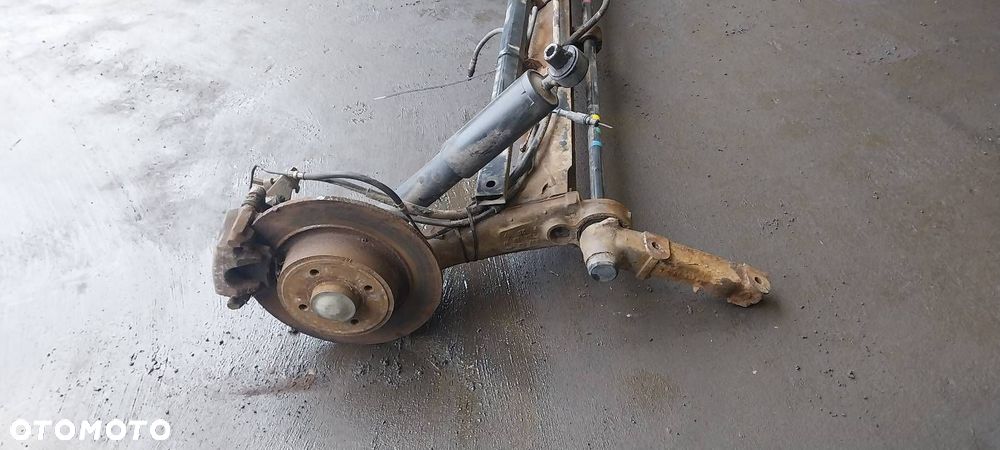 BELKA OŚ ZAWIESZENIA TYŁ TARCZE Z ABS RENAULT MEGANE I LIFT KOMBI - 4