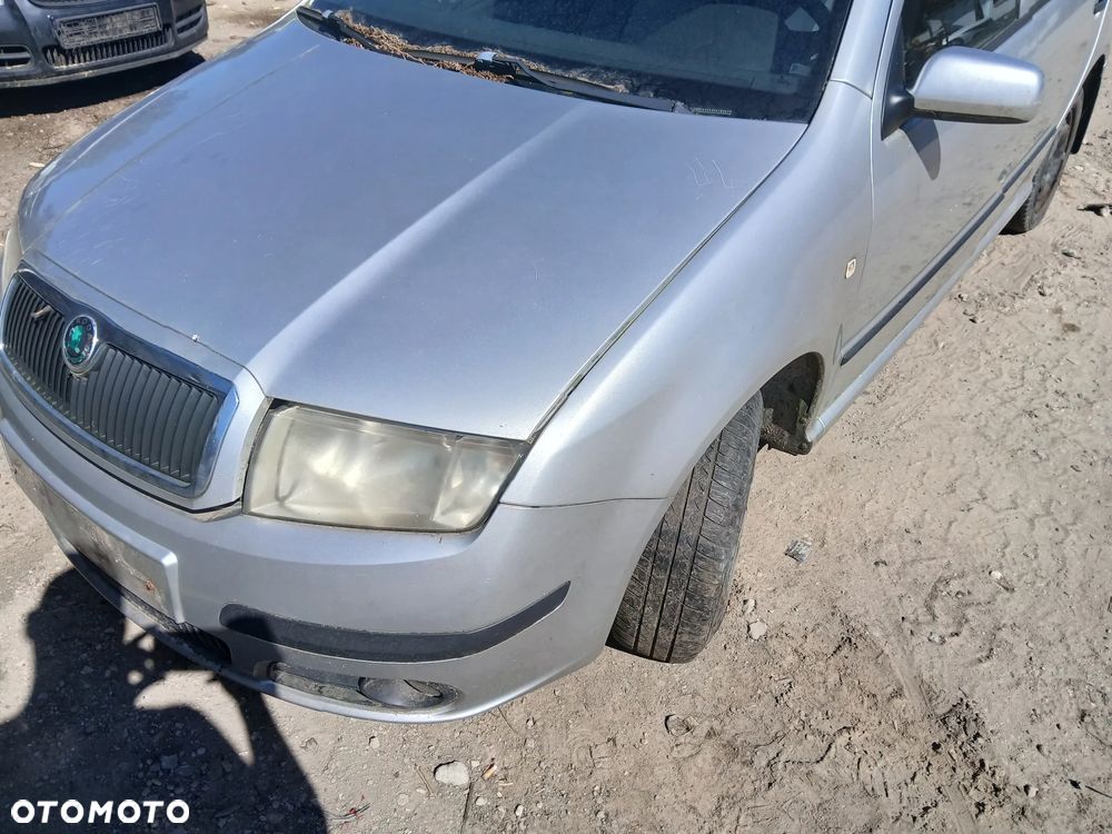 skoda fabia I LF7T  fotel fotele kanapa deska kokpit podsufitka boczek boczki klamka podłokietnik - 1