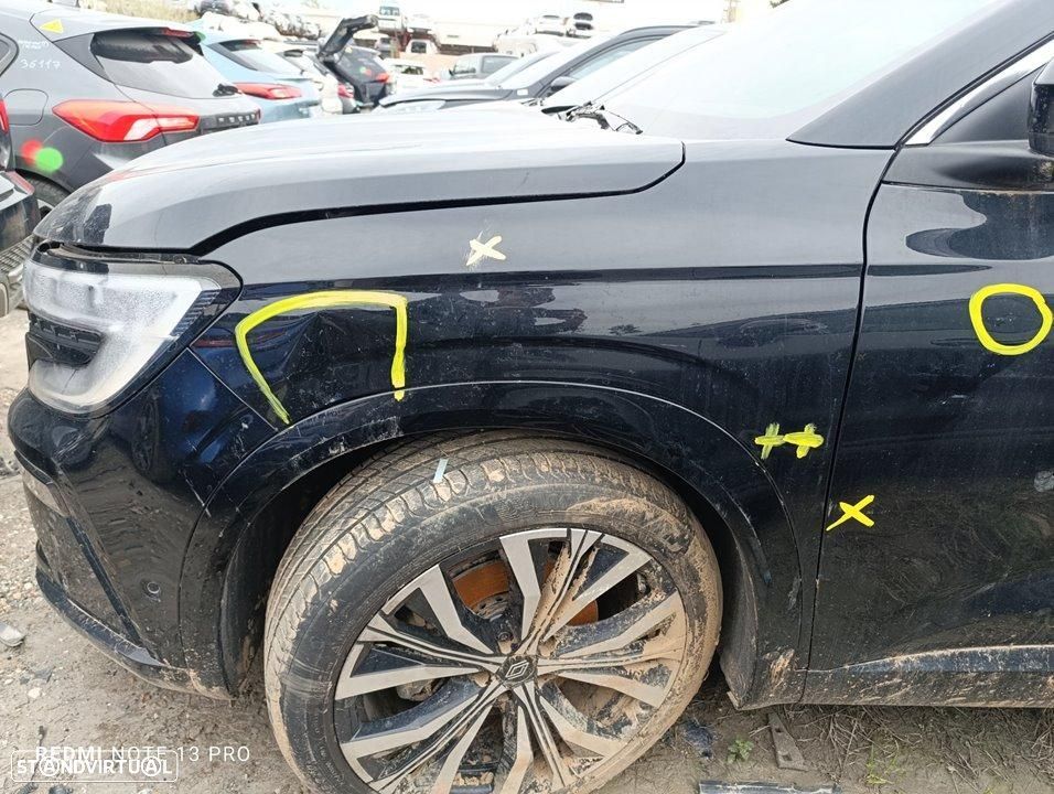 GUARDA-LAMAS FRENTE ESQUERDO RENAULT AUSTRAL - 1