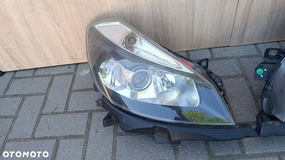 REFLEKTOR 2 LAMPY PRZÓD LEWA PRAWA EUROPA RENAULT CLIO III 3 8200261612 - 3