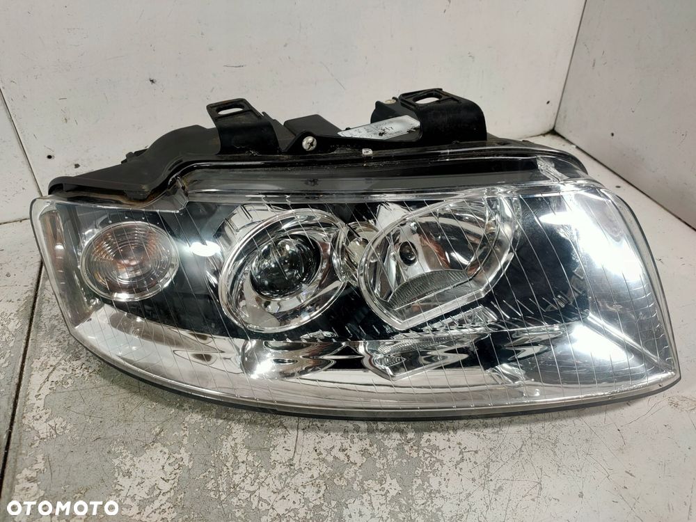lampa przód prawa audi a4 b6 - 4