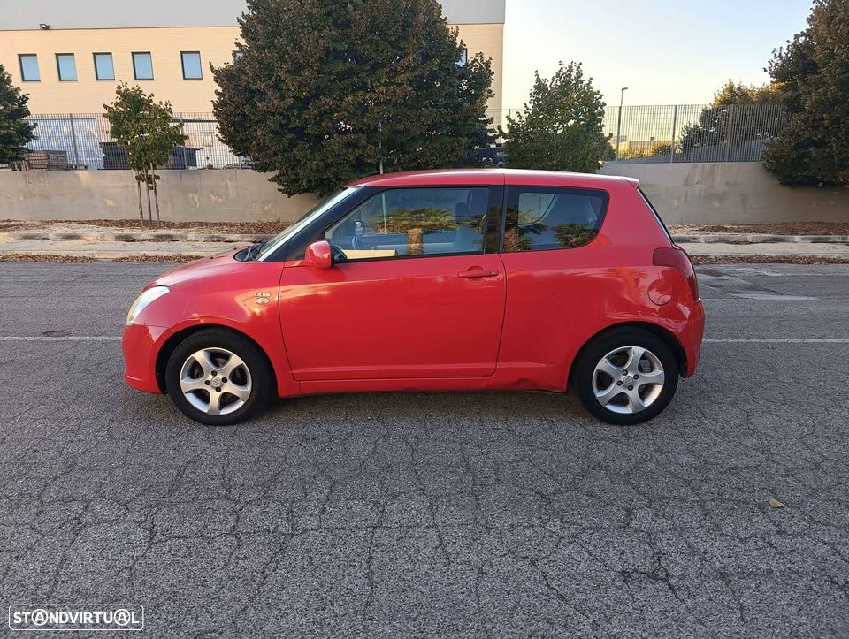 Suzuki Swift 1.3 DDiS GLX - 9