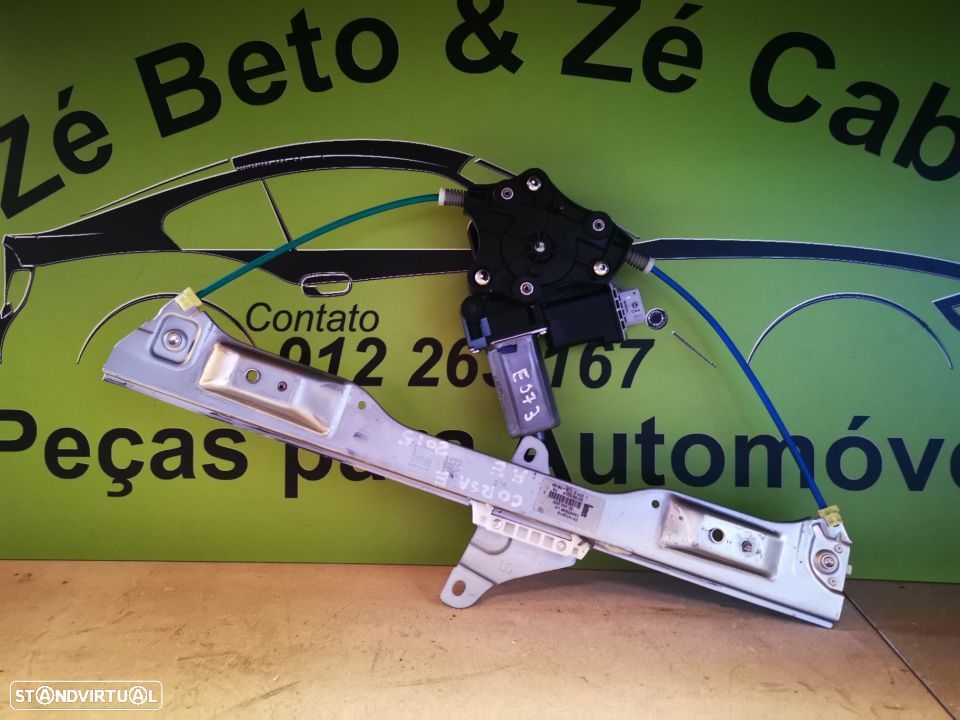 OPEL CORSA E ELEVADOR PORTA FRENTE ESQUERDA - E073 - 1