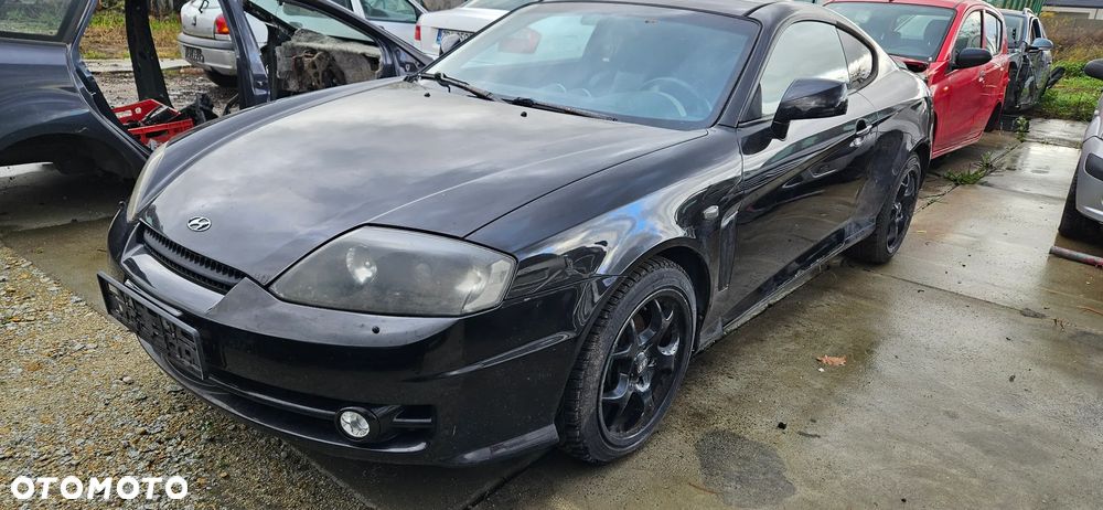 Maska pokrywa Hyundai Coupe II 2003r lak. EB - 2