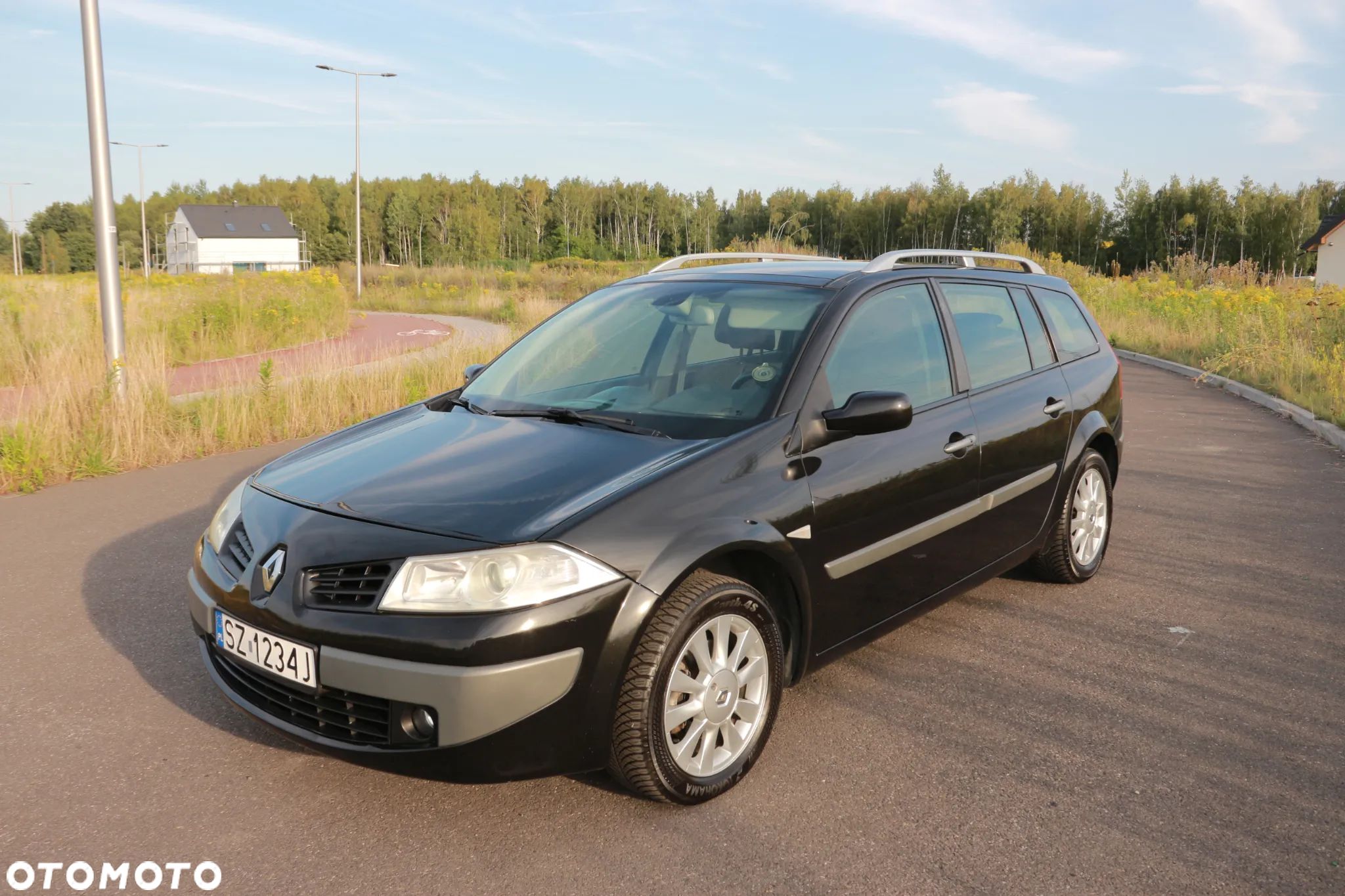 Renault Megane 1.6 Grandtour Exception - 1