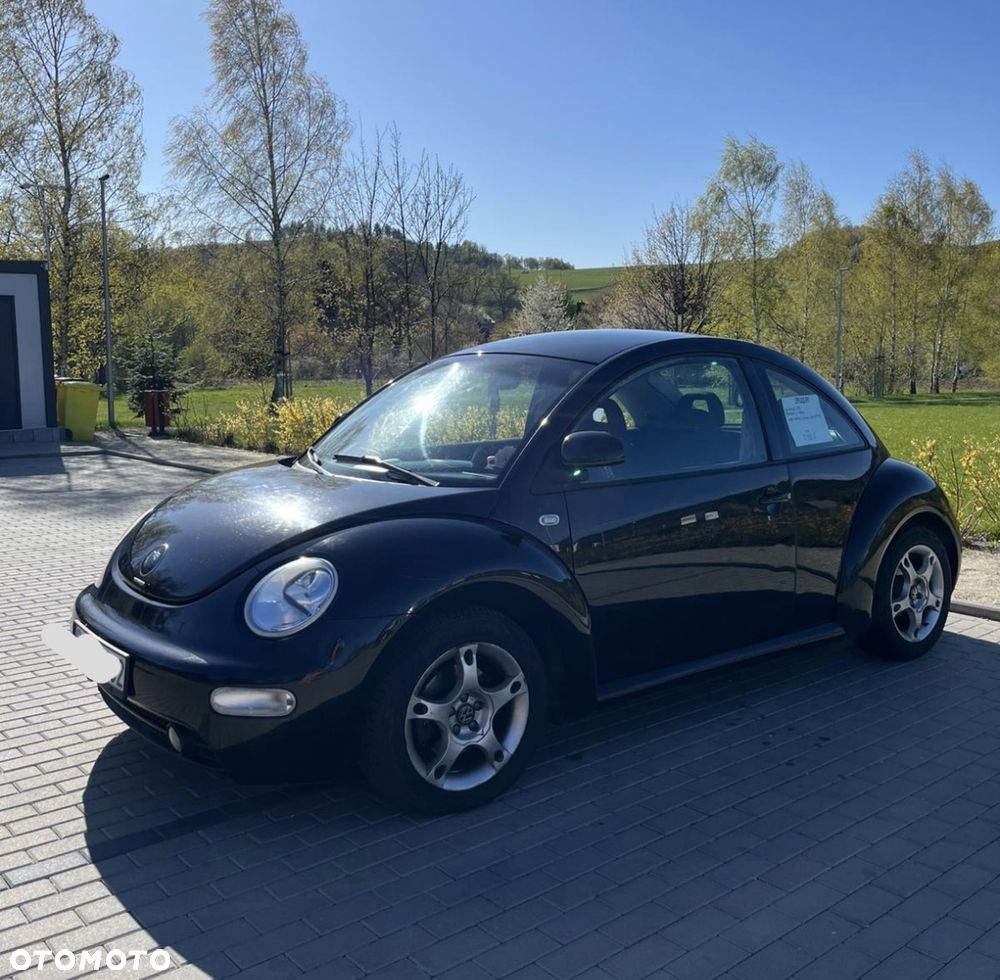 Volkswagen New Beetle 2.0 - 4