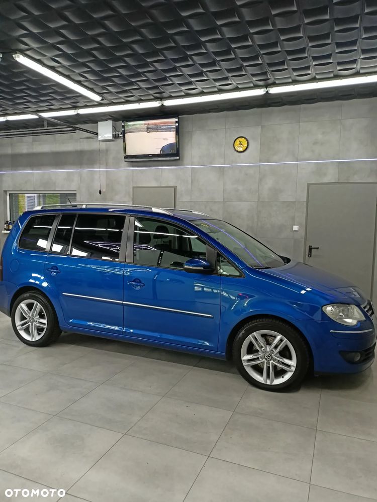 Volkswagen Touran 1.4 TSI Highline DSG - 1