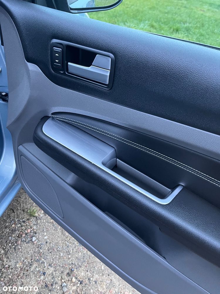 Ford Focus 1.8 Ghia - 27