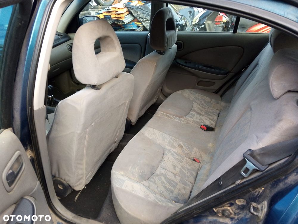 Nissan Almera N16 (00-02.) 1.5 B 89KM. Silnik QG15DE Skrzynia 4M40.Cały na części. GWARANCJA !!! Przód Tył Zestaw Komplet Drzwi Klapa Zderzak Błotnik Maska Grill Atrapa Szyba Pas Lampa Lusterko Boczki Fotel Kanapa Kokpit Deska Rozdzielcza Przełącznik Włącznik Sterownik Przewody Wiązka Instalacja Moduł Komputer Czujnik Listwa Pompa Alternator Wtryski Głowica Rozrusznik Kompresor Sprzęgło Dwumas Silnik Skrzynia ABS Klimatyzacji Paliwa Wspomagania Kolektor Turbina Przepustnica Zawór Chłodnica Koło Hak Belka Sanki Zawieszenie Mcpherson Półoś Amortyzator Wydech Tłumik Zacisk Most - 9