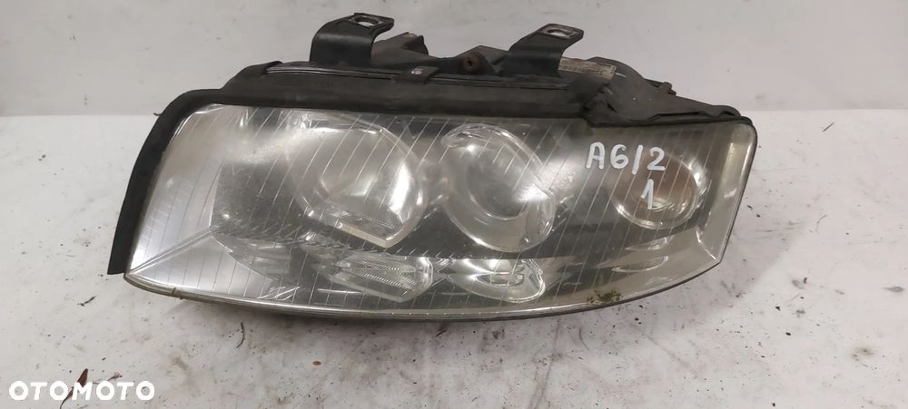 .  LAMPA PRZOD PRZEDNIA LEWA AUDI A4 B6 - 1