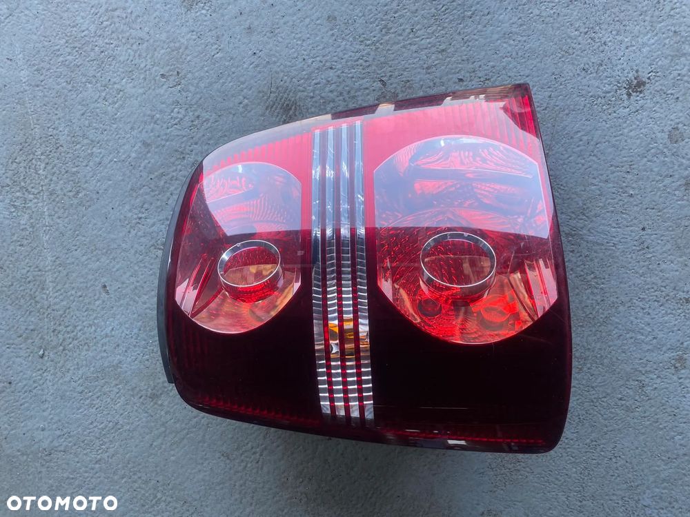 VW TOURAN LAMPA LEWA LIFT 1T0945095J - 1