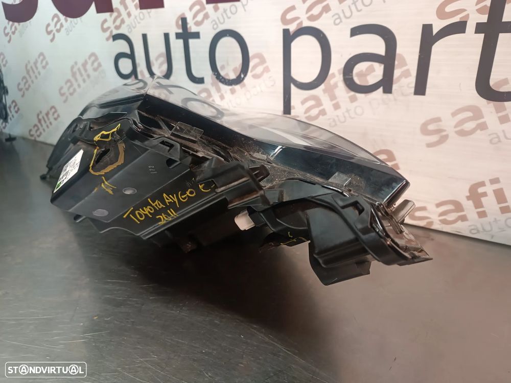 ÓTICA / FAROL TOYOTA AYGO X 2022-2025 - ESQUERDO 02A29318 (APOIOS PARTIDOS) - 18