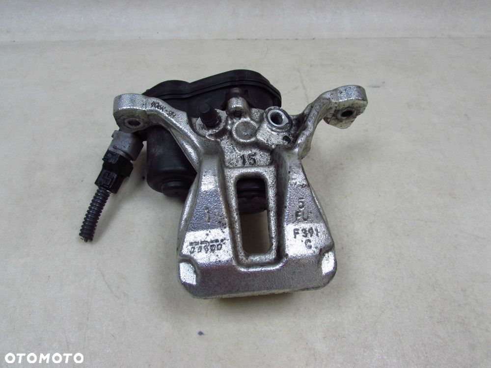 TOYOTA COROLLA E21 C-HR 19-23 ZACISK HAMULCOWY LEWY TYL ELEKTRYCZNY - 1