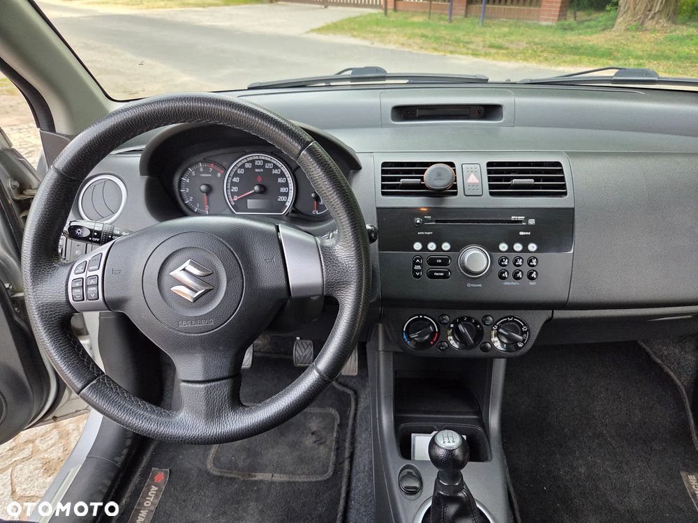 Suzuki Swift 1.3 Club - 8
