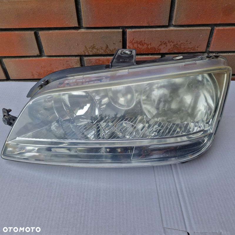 ORYGINAŁ FIAT IDEA MULTIPLA II REFLEKTOR LEWY 51780723 - 2