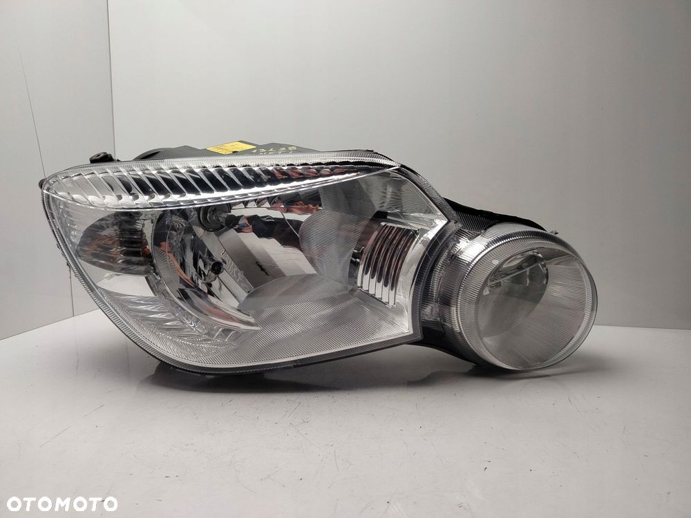 skoda yeti 09r- reflektor lampa prawy przód prawa przednia - 1