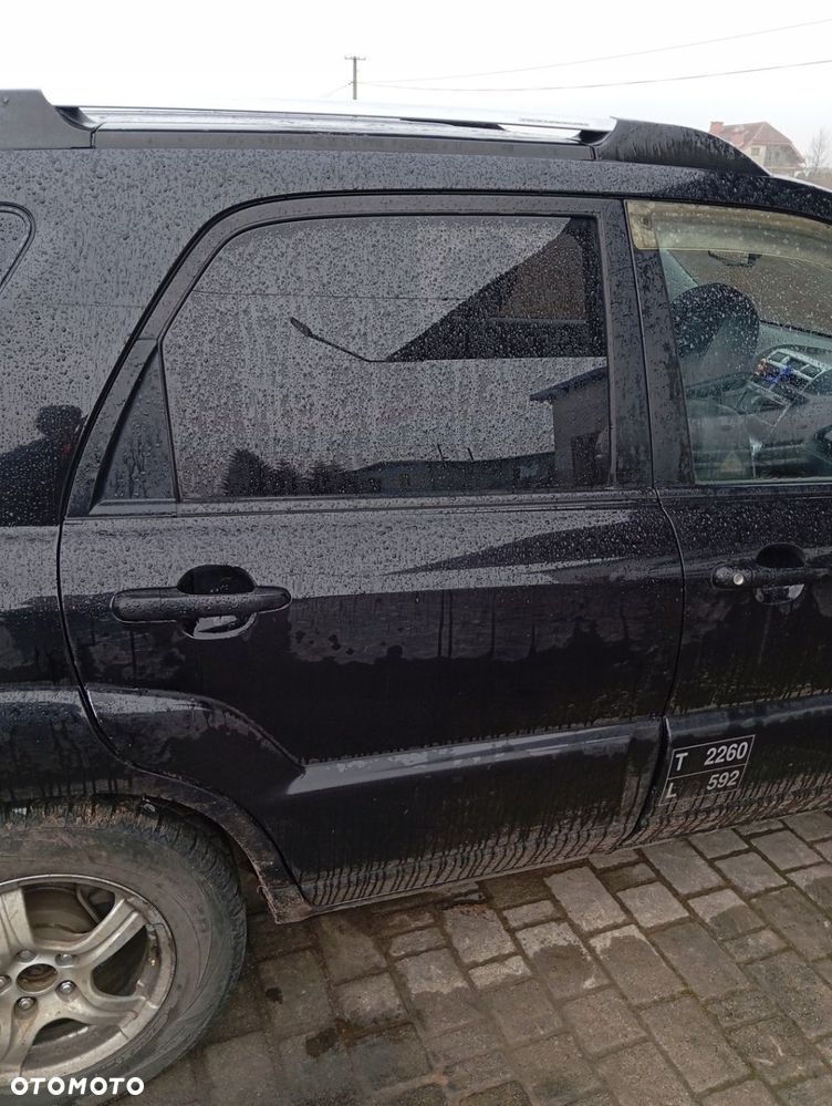 KIA SPORTAGE II DRZWI PRAWE TYLNE TYŁ GOŁE 9P - 1