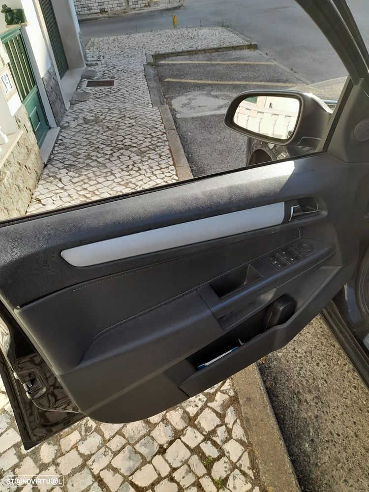Opel Astra Caravan 1.9 CDTi Cosmo - 11
