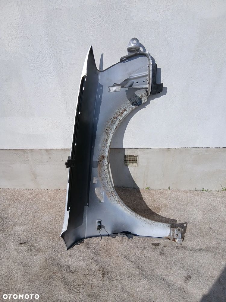 BŁOTNIK PRZEDNI LEWY AUDI A4 B7 - 5