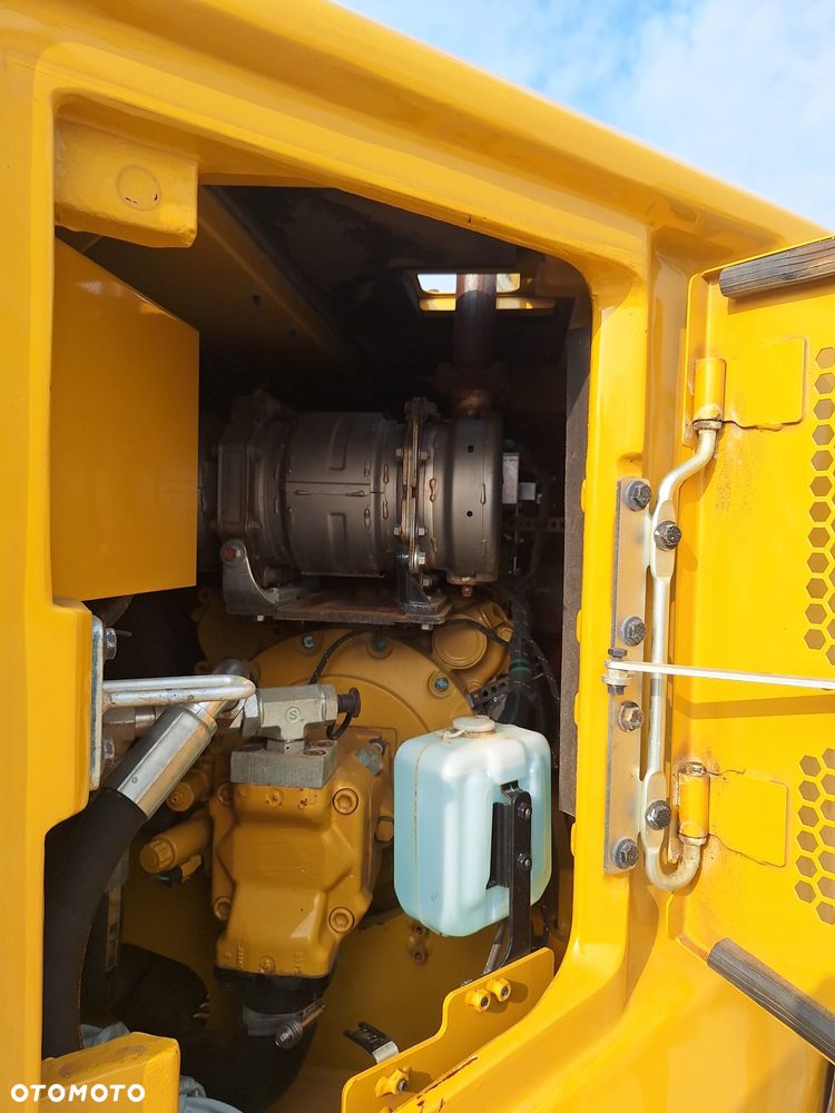 Caterpillar 310 - 9
