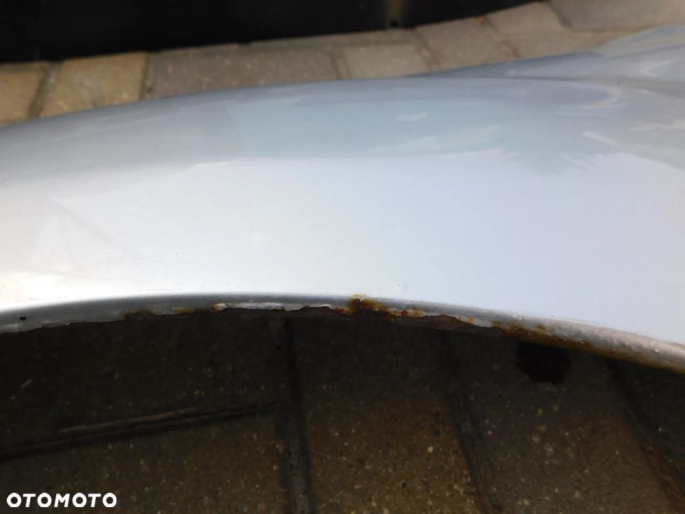błotnik lewy przód FORD FOCUS II LIFT FL  03 - 4