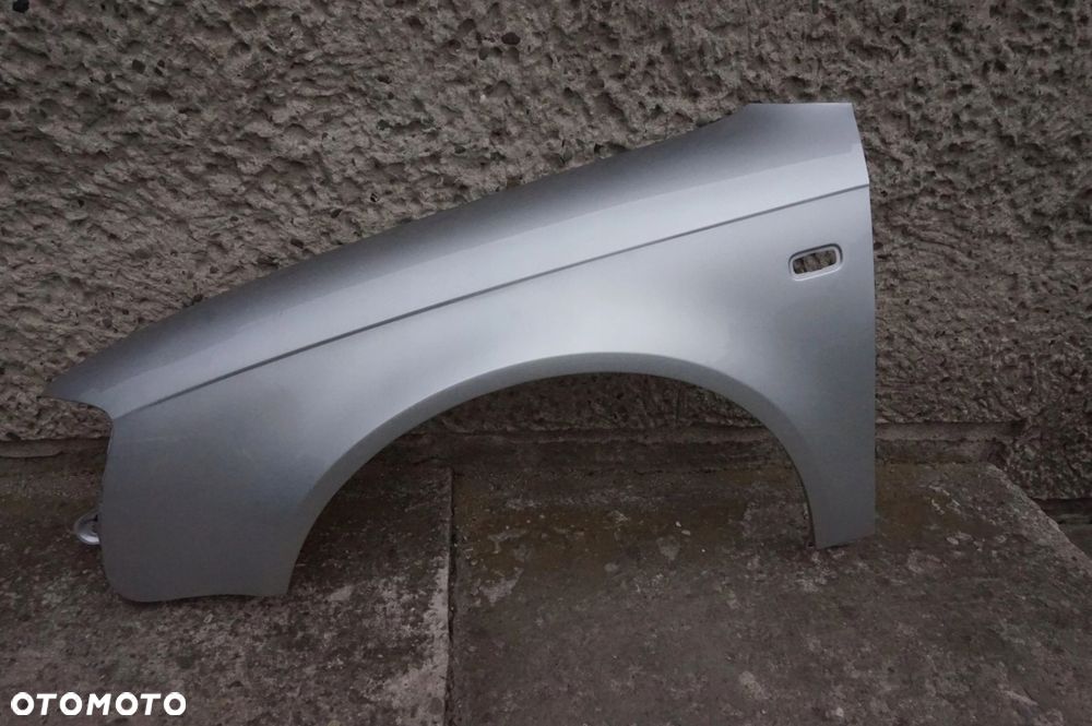 BŁOTNIK PRZEDNI LEWY AUDI A4 B7 LY7W 04/07r - 4