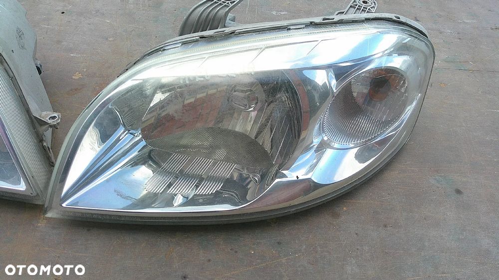 CHEVROLET AVEO T255 LAMPA PRZEDNIA LEWA - 3