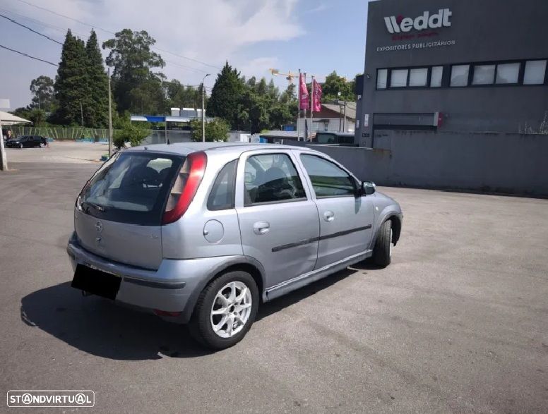 Opel Corsa 1.2 16V Cosmo - 6