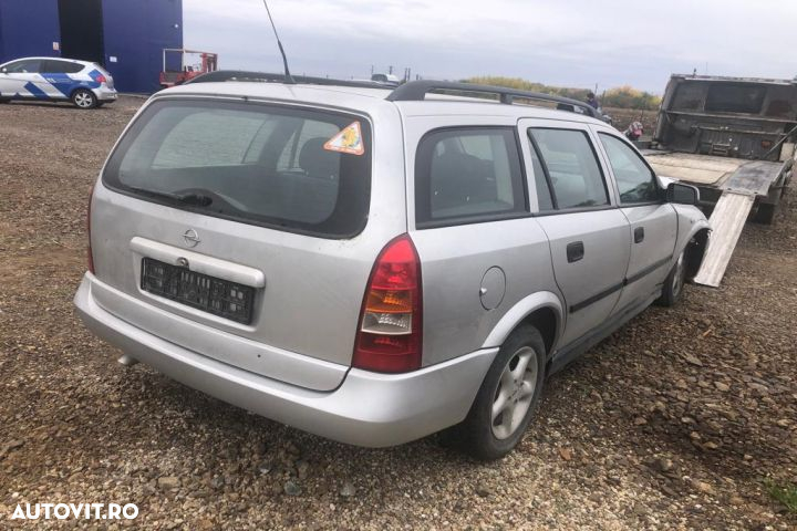 Vas expansiune Opel Astra G  [din 1998 pana  2009] seria wagon 5-usi 1.7 DTi MT (75 hp) - 3