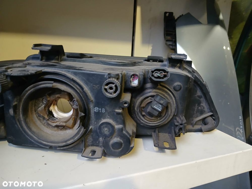 BMW e39 lampa przednia lewa Hella - 5