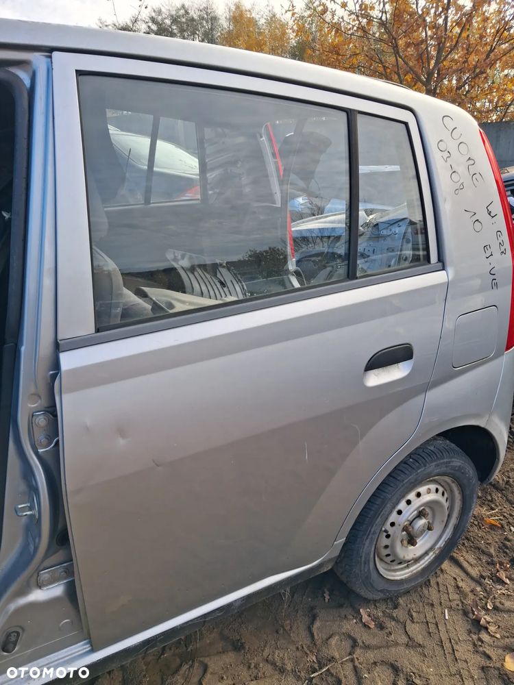 Daihatsu cuore 03 drzwi lewy tyl E28 - 4