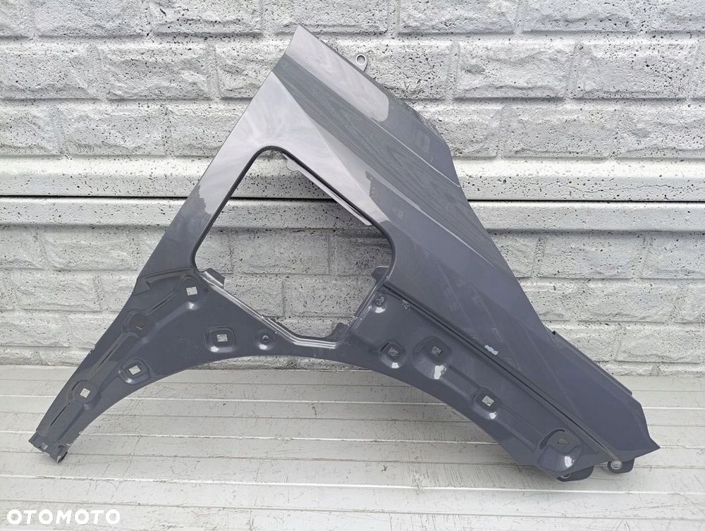 KIA EV3 24- BŁOTNIK PRAWY PRZEDNI ORYGINAŁ