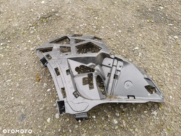 Renault Scenic III Ślizg zderzaka lewy przód mocowanie