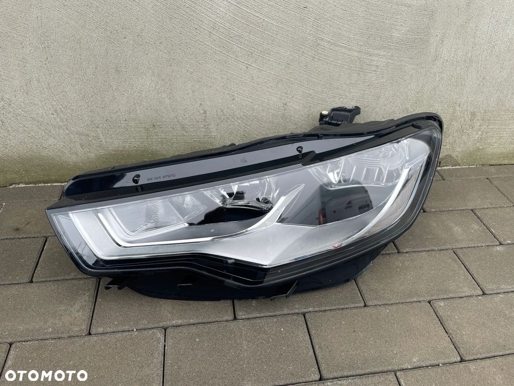 LAMPA PRZEDNIA LEWA AUDI A6 C7  2010-2014 - NOWA - 1