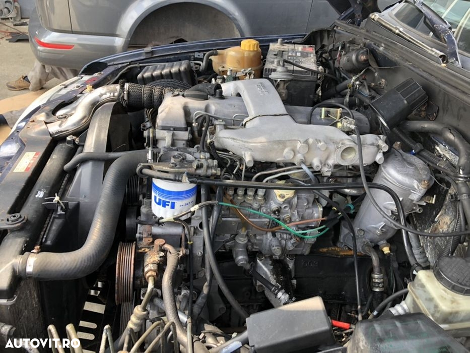 Compresor climă Ssang Yong musso daewoo 2.9 td mercedes D29M Om602 cutie manuala 5 trepte bara fata capota fără stop geam usa - 2