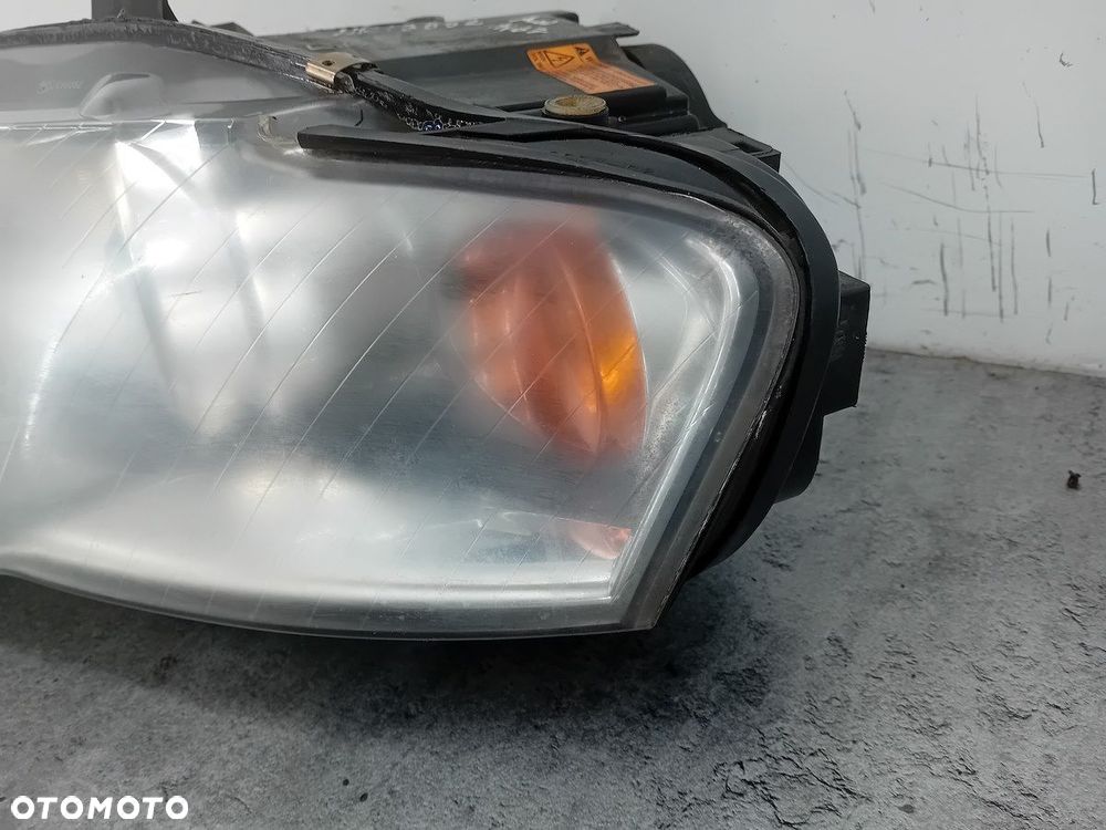 LAMPA PRZÓD LEWA XENON AUDI A4 B7 - 5