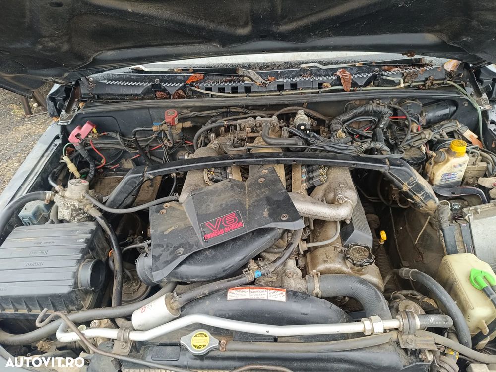 Dezmembrez Suzuki Vitara 1.68v si 2.0v6 - 9