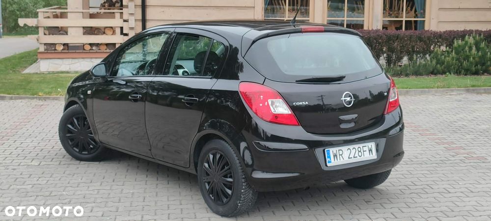 Opel Corsa 1.4 16V Silverline - 9