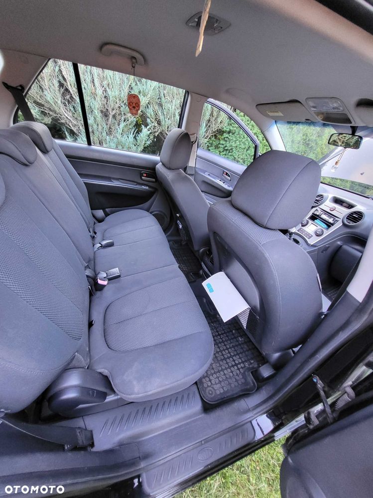 Kia Carens - 8
