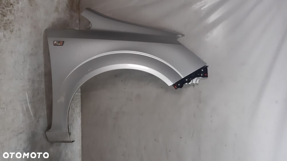 * OPEL ZAFIRA B Z157  BŁOTNIK PRZÓD PRZEDNI PRAWY SREBRNY - 1